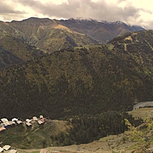 Scenic panoramic view of Dochu village in Tusheti region during a high Caucasus mountain expedition in Georgia.