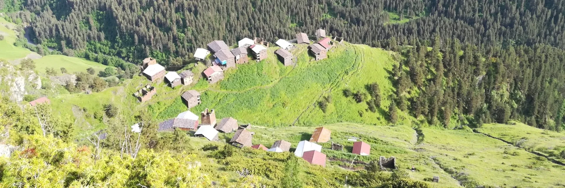 High-angle panoramic view of the historic stone houses in Dochu village Tusheti