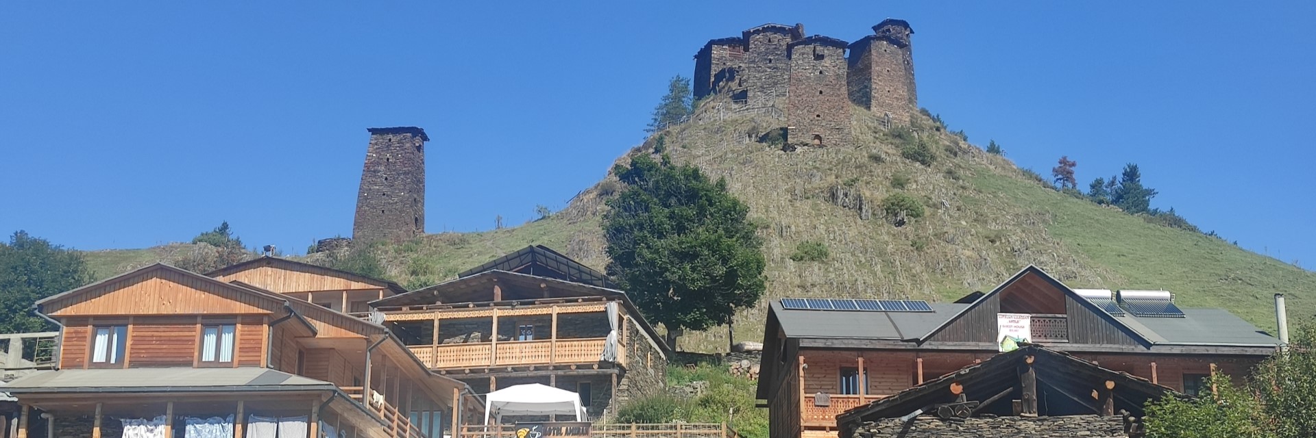 The historic Keselo Towers on top of the hill above guesthouses in Omalo Tusheti