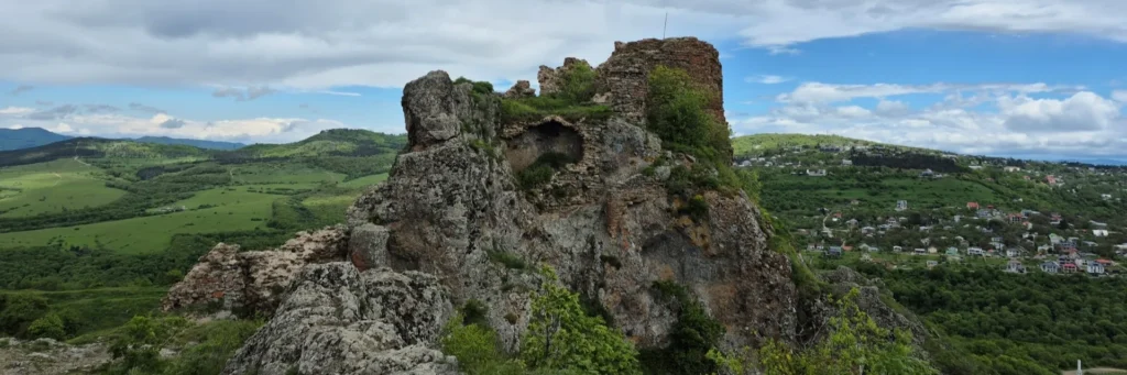 Panoramic green valley and Kojori village view from Khoroghli Castle ruins