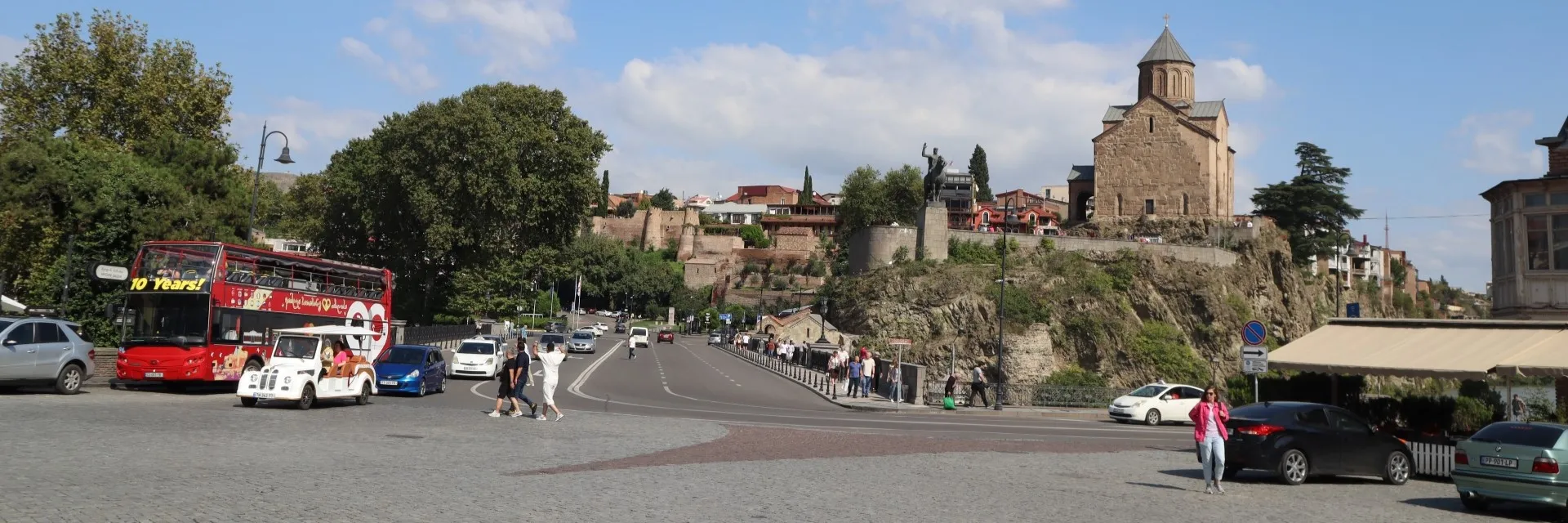 Panoramic view of Metekhi Church on the cliff overlooking Europe Square in Tbilisi